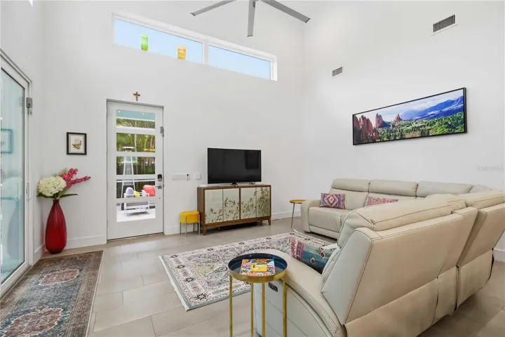 Light and Bright Interior with Vaulted Ceiling and All Impact Windows / Sliders