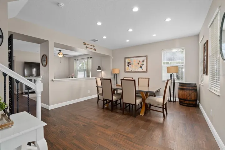 formal dining room with wood look tile