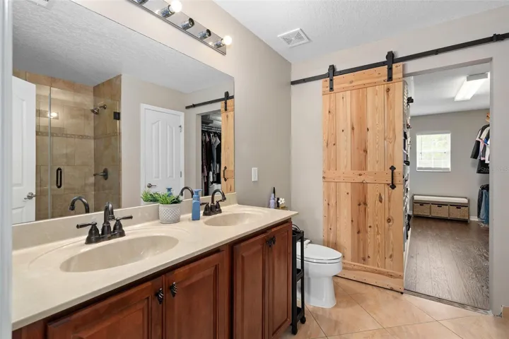 master bathroom with his/hers sinks