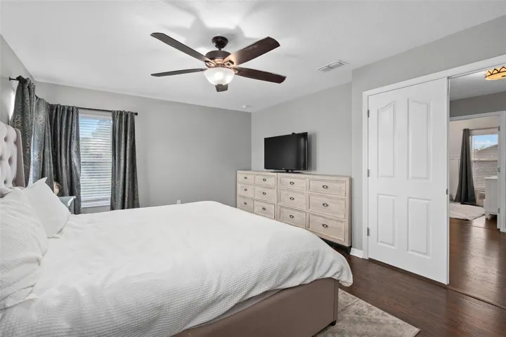 master bedroom upstairs with double door entry
