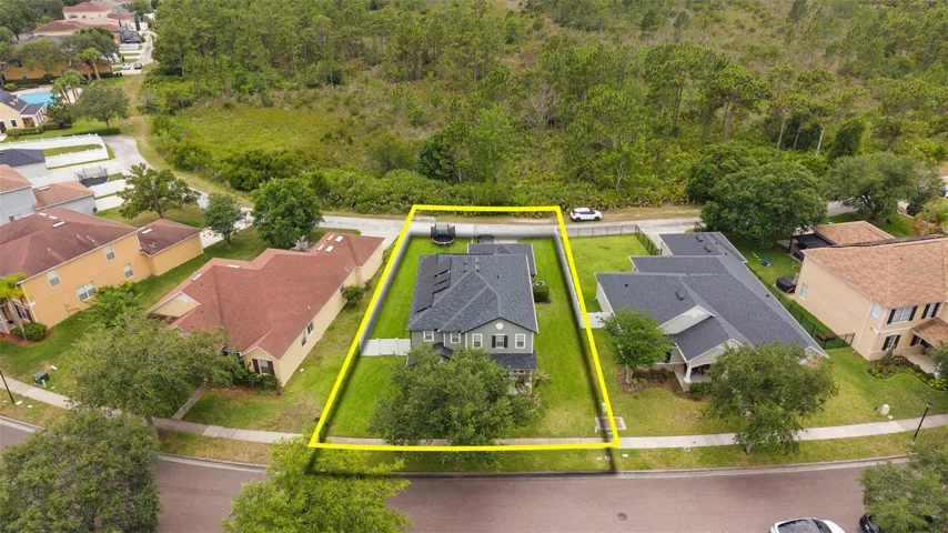 top of home showing no rear neighbors and solar panels.