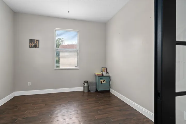 bedroom 5 downstairs but also could be used as an office/den/flex