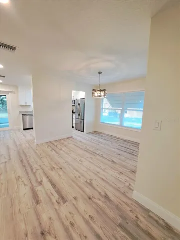 open living/dining room + kitchen