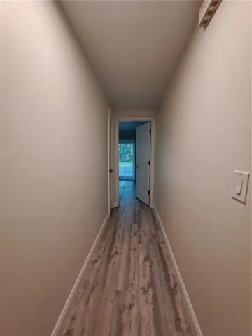 hall looking at primary suite