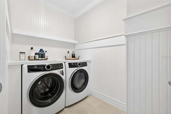Downstairs laundry room with custom beadboard