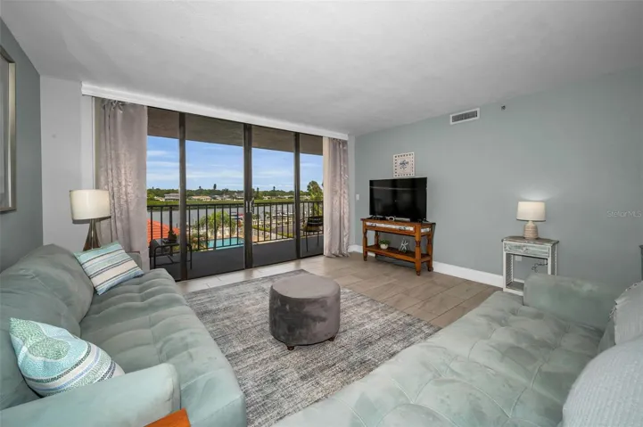 Living area with the balcony steps away