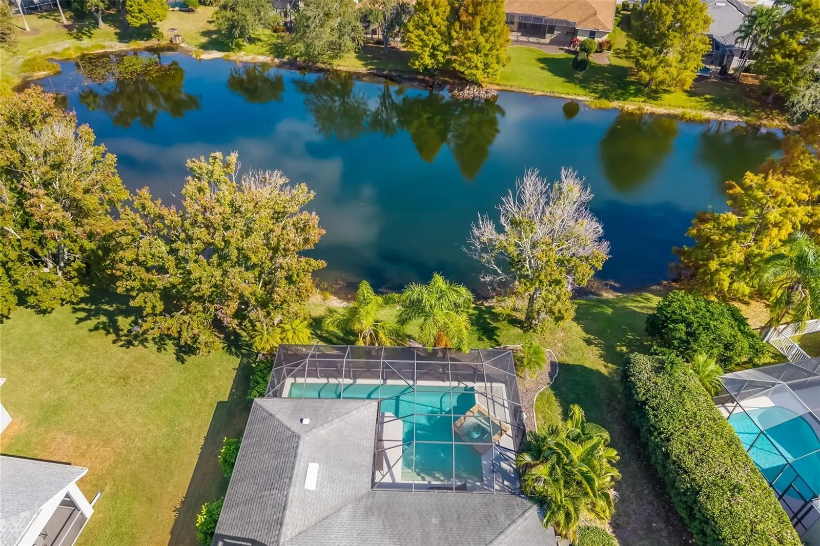 Mature Oaks and Palms adorn this estate