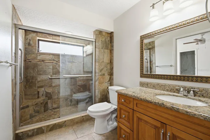 hallway bathroom with access to bedroom 3