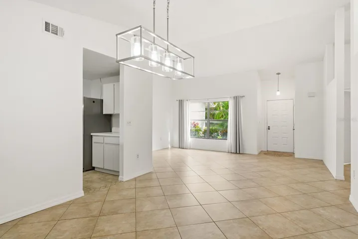 dining with kitchen entry
