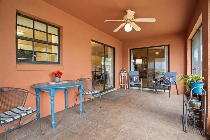 Screened in back patio, leads to the additional large covered back patio