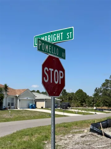 Lambright St SW and Pomello Ave SW intersection sign