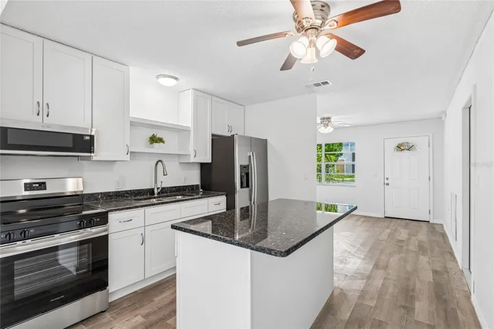 Granite countertops and stainless steel appliances