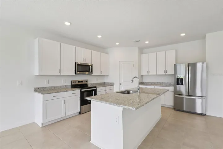 The interior photos are of another home with the same floor plan and interior finishes. Some details may vary