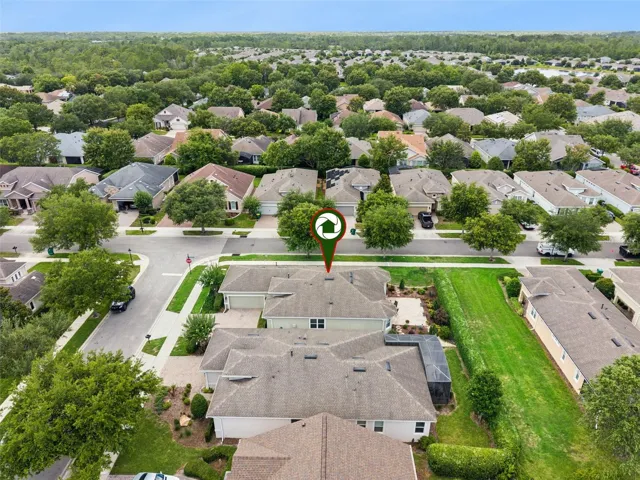 Aerial view from side of home & view of the backyard