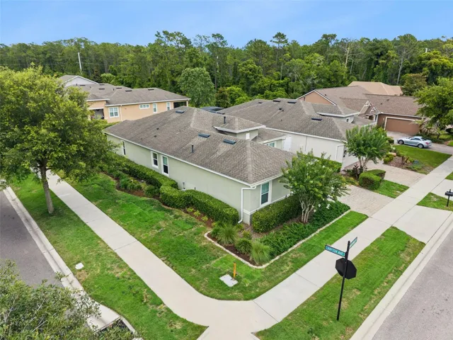 Aerial view of the home with a corner homesite