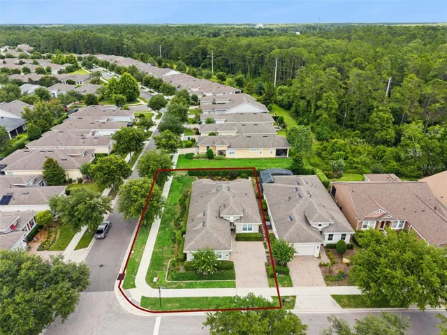Aerial view of home's location w/ conservation area view to the right