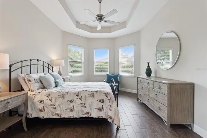 Primary Bedroom w/ multiple windows for natural light