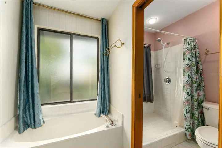 Soaker tub with seperate shower