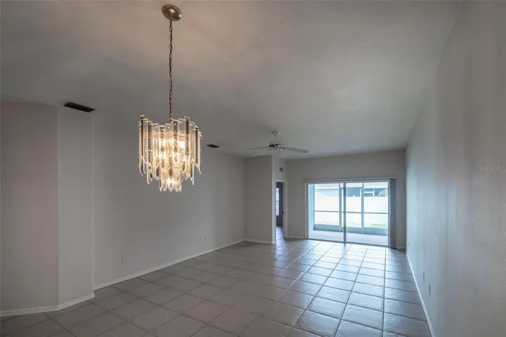 Great Room with Dining Room Light Fixture