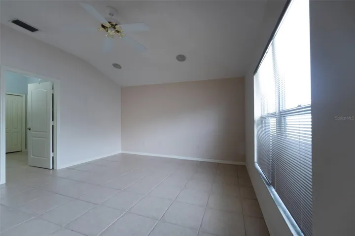 Primary Bedroom with door to Bathroom on left
