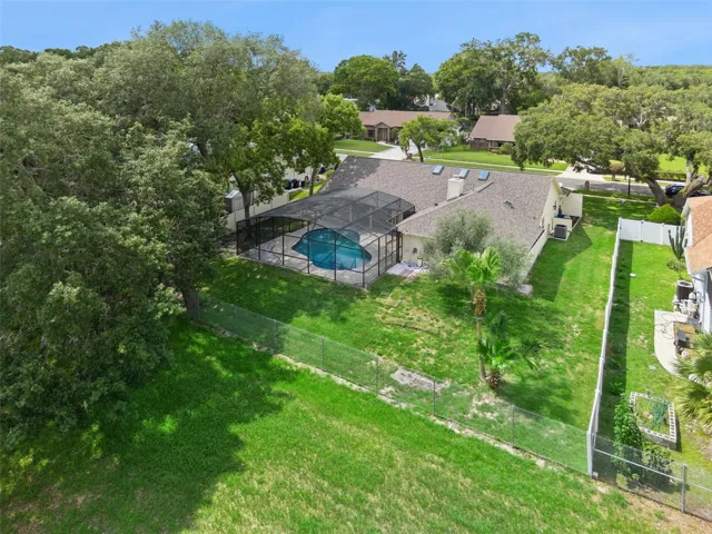 This lovely home sits right on a lovely tranquil lot