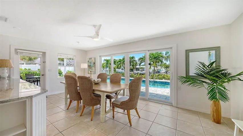 Spacious dining room with great view of the pool.