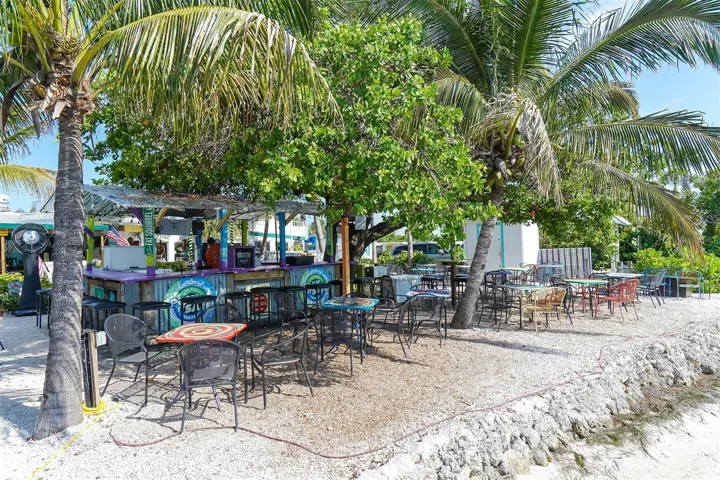 Sit at the waters Edge for tropical cocktails and watch the the wildlife.Sit at the water's edge, have a tropical drink and watch the waves roll by.