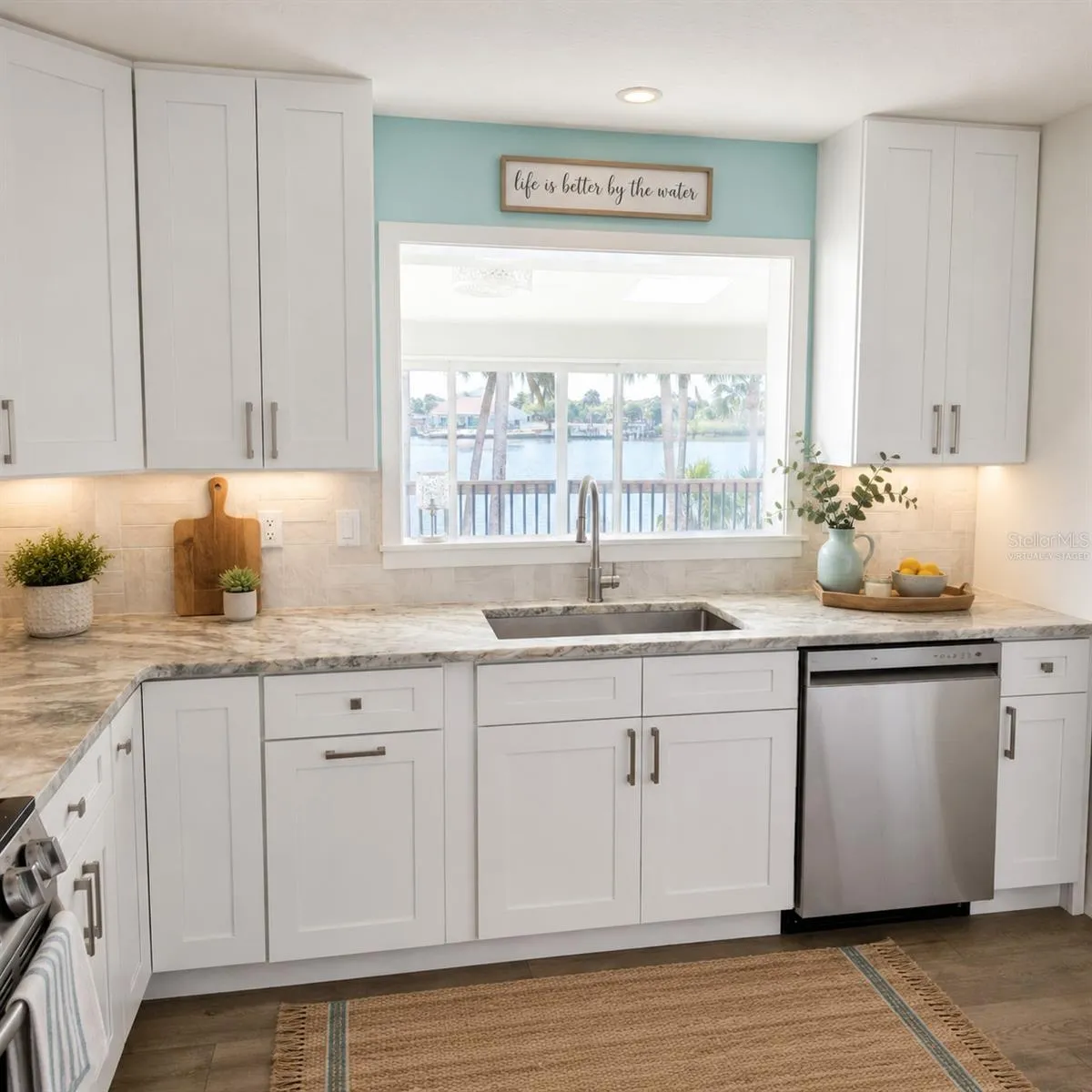Virtually Staged. Kitchen View from the sink and another way to enjoy the view of the water.