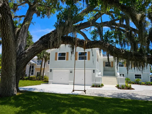 View of 100 year old Oak tree in fron of the home