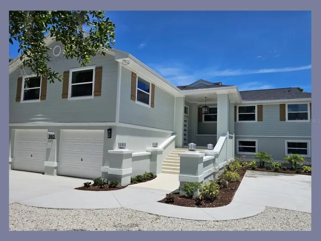 Front of Home with new Roof, Hardie Siding, and Concrete Driveway