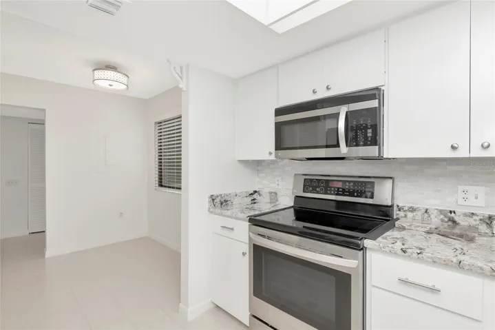 Kitchen looking back to dinette