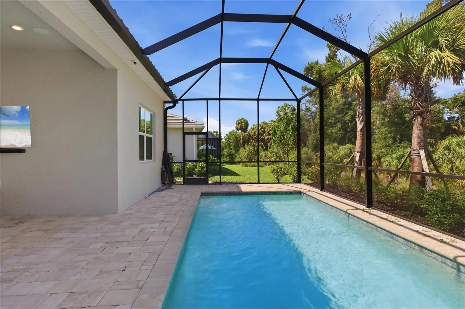 Saltwater pool with extended lanai