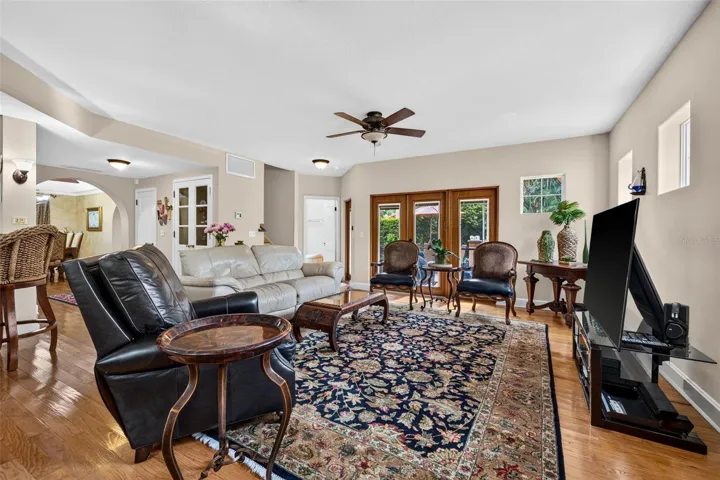 Living Room With Doors Going Outside