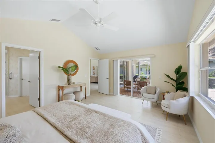 Primary bedroom with slider to lanai