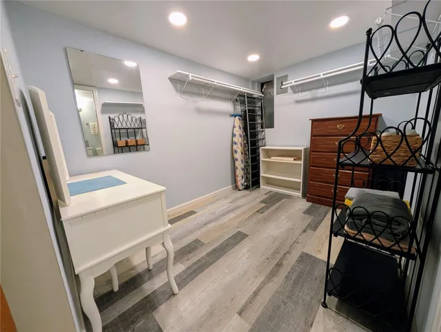 Updated the lighting and flooring - amazing space now.