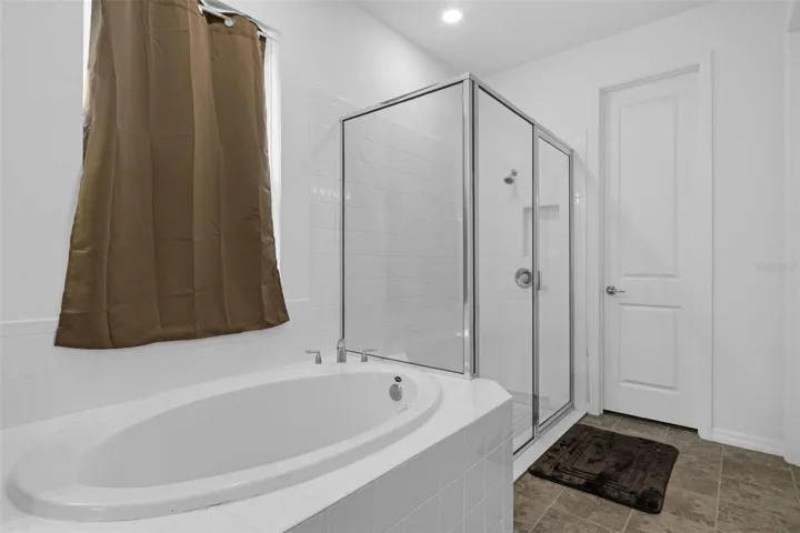 Primary Bathroom 1 - Garden Tub with Shower