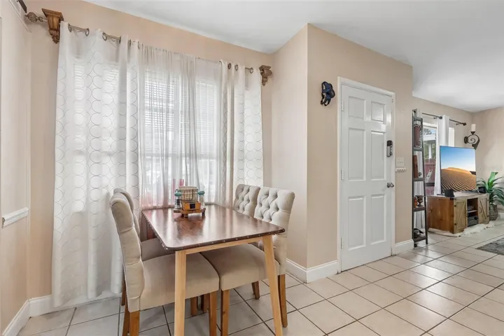 The Living Room seamlessly connects to the Dining area and UPDATED KITCHEN, making everyday living and entertaining effortless.