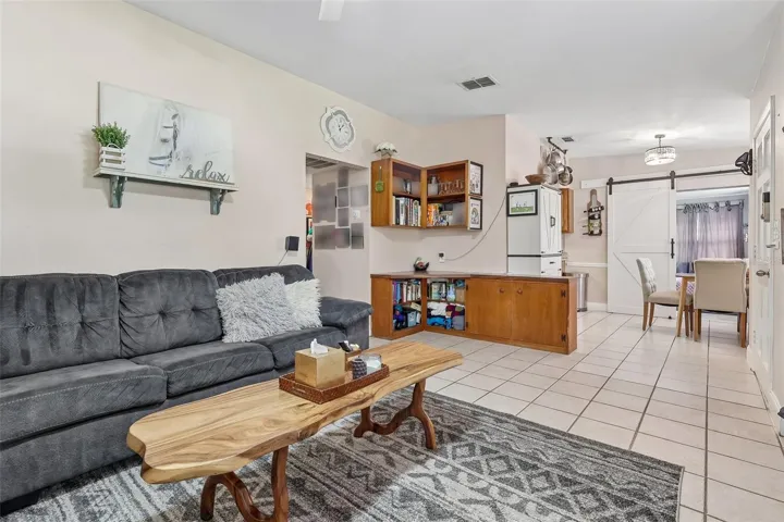 Step inside to discover bright, welcoming spaces filled with NATURAL LIGHT. Easy-to-care-for CERAMIC TILE FLOORING flows throughout the main living areas, while a large picture window in the Living Room creates a warm and inviting atmosphere.