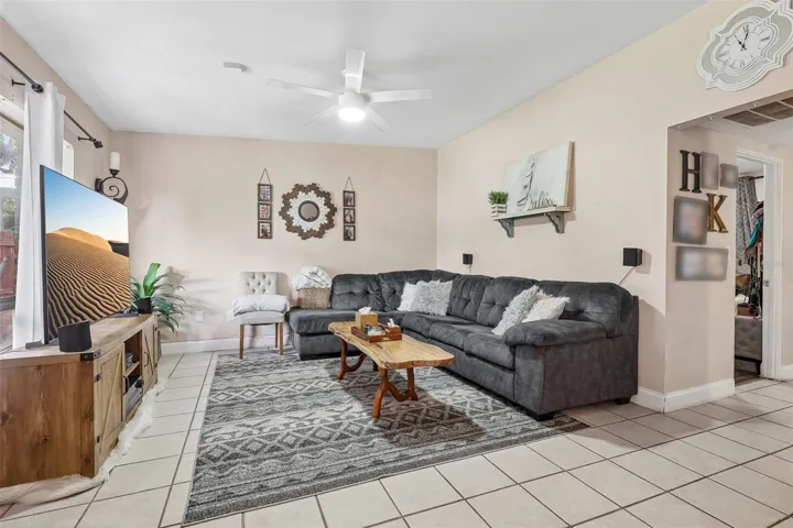 Step inside to discover bright, welcoming spaces filled with NATURAL LIGHT. Easy-to-care-for CERAMIC TILE FLOORING flows throughout the main living areas, while a large picture window in the Living Room creates a warm and inviting atmosphere.