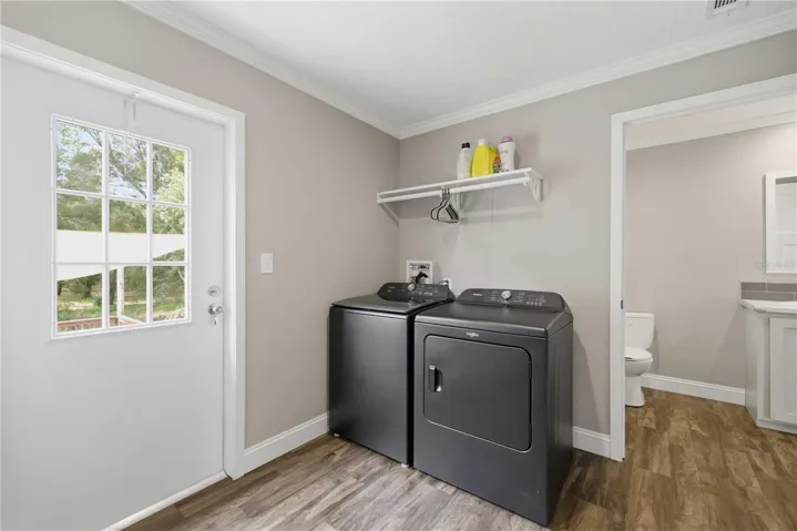 inside laundry. washer and dryer pictured do not convey.
