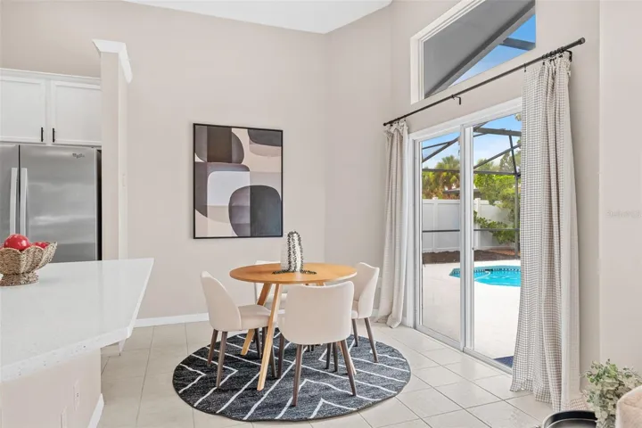 Eat in kitchen overlooking pool area