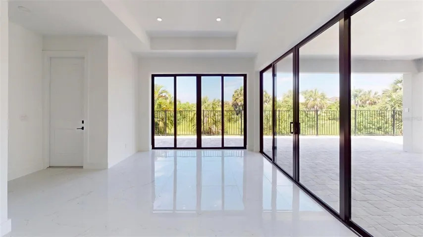 Dining Room with sliders leading out to expansive Patio
