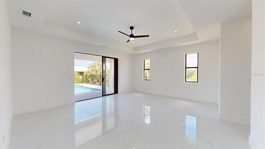 Primary Bedroom with Pool just outside of sliders