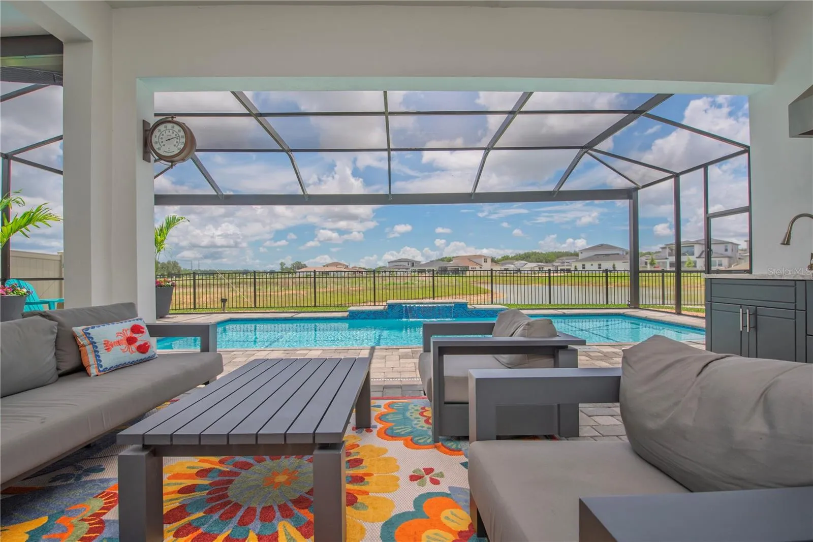 Clear-view landscape pool screen.