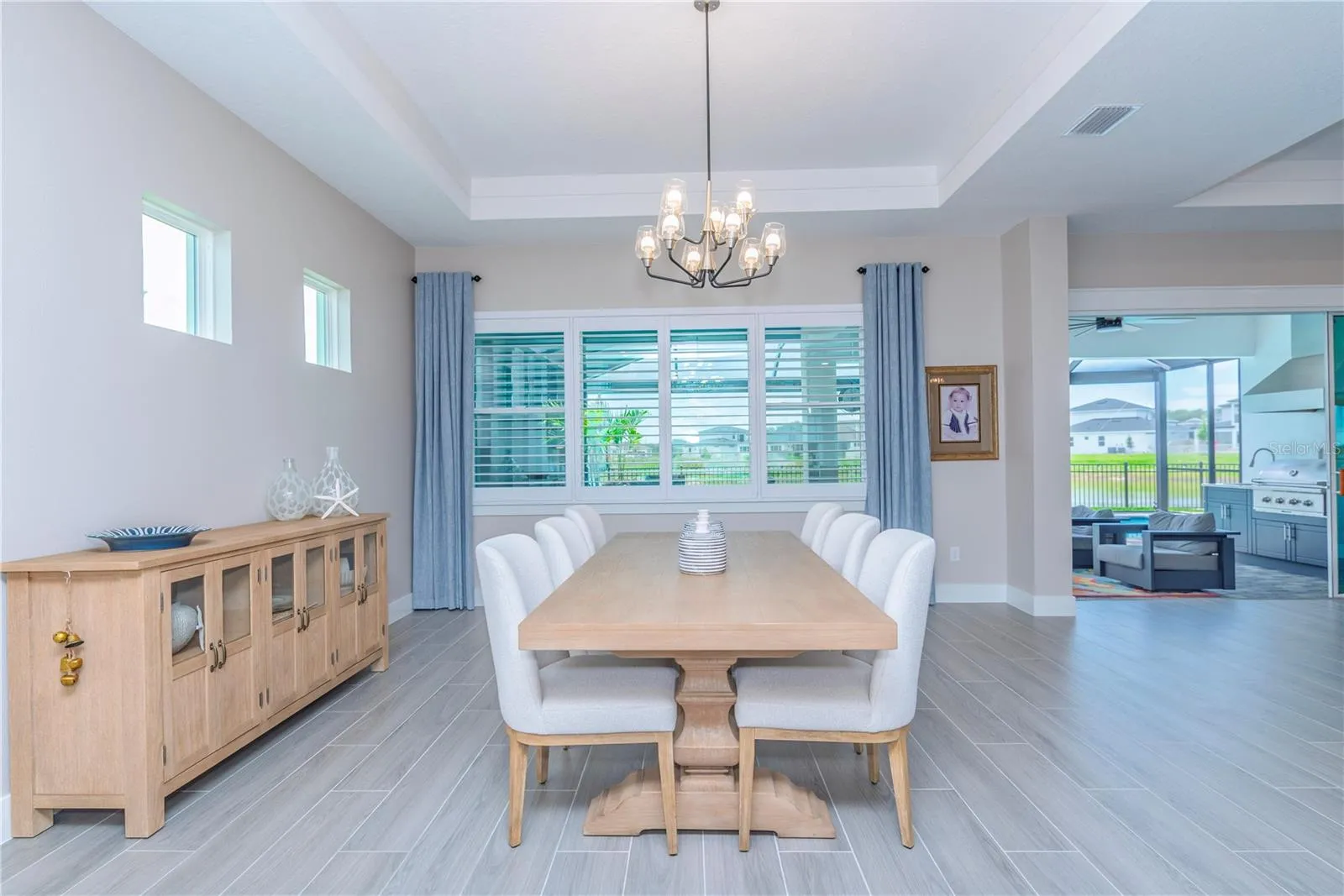 Dining room with view to lanai and water.