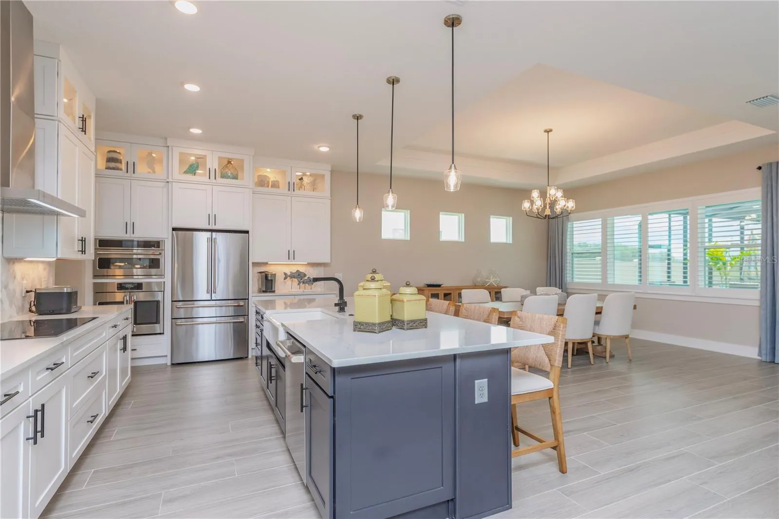 Gourmet kitchen with upgraded stainless steel appliances.