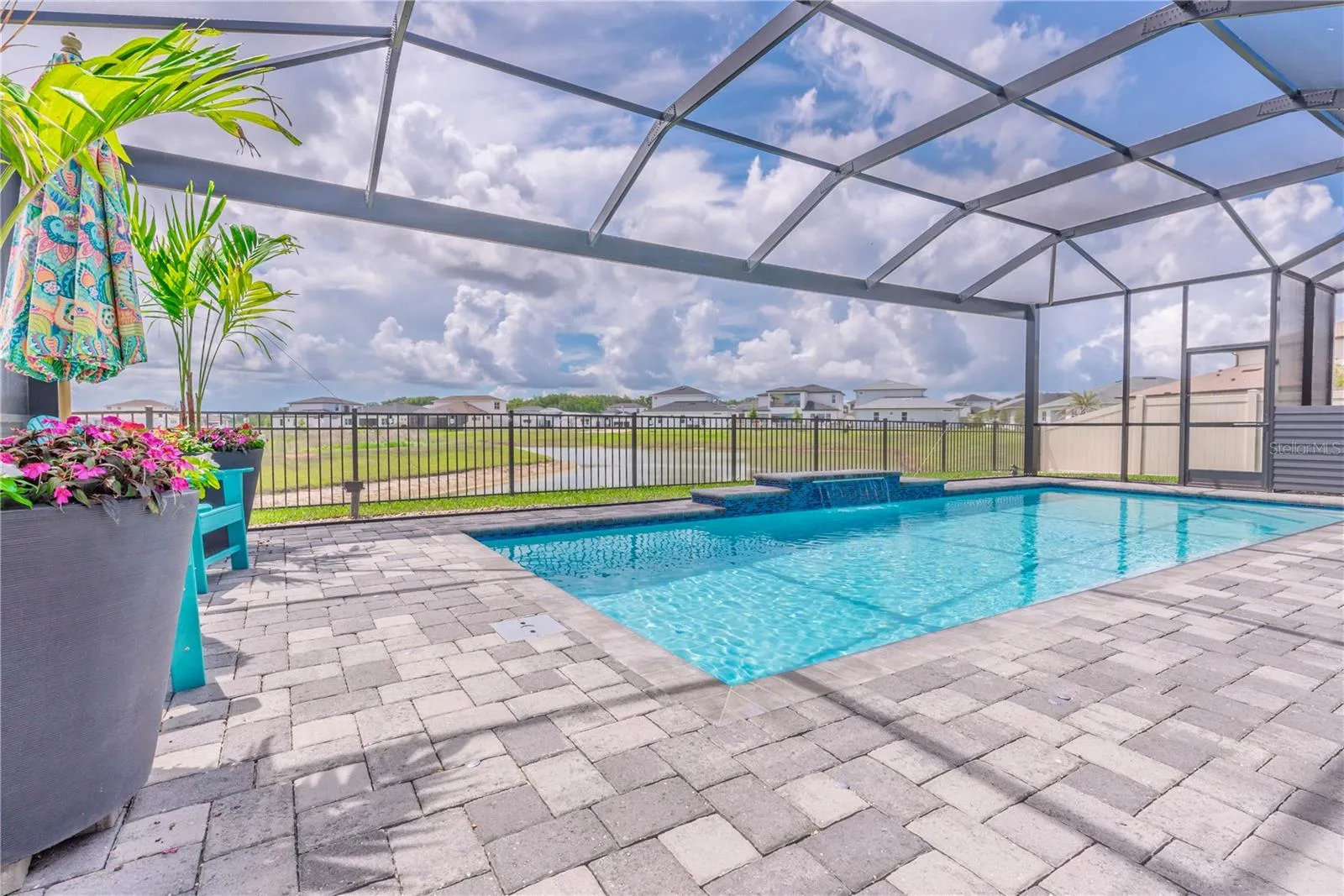 Panoramic views to the water overlooking the pool.