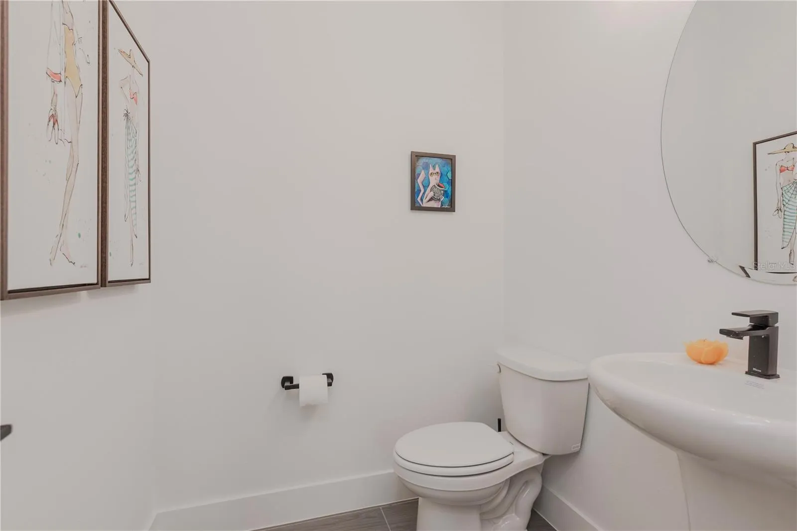 Downstairs half bathroom/powder room.