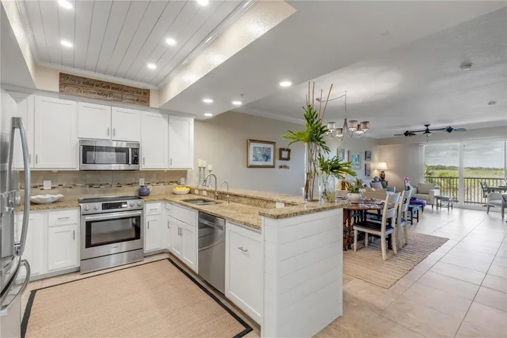 Kitchen with shiplap ceiling and lighting