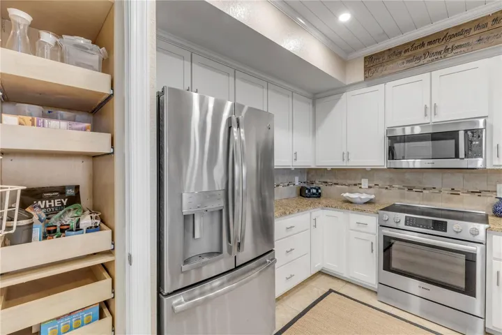Kitchen with pantry and pull out shelving